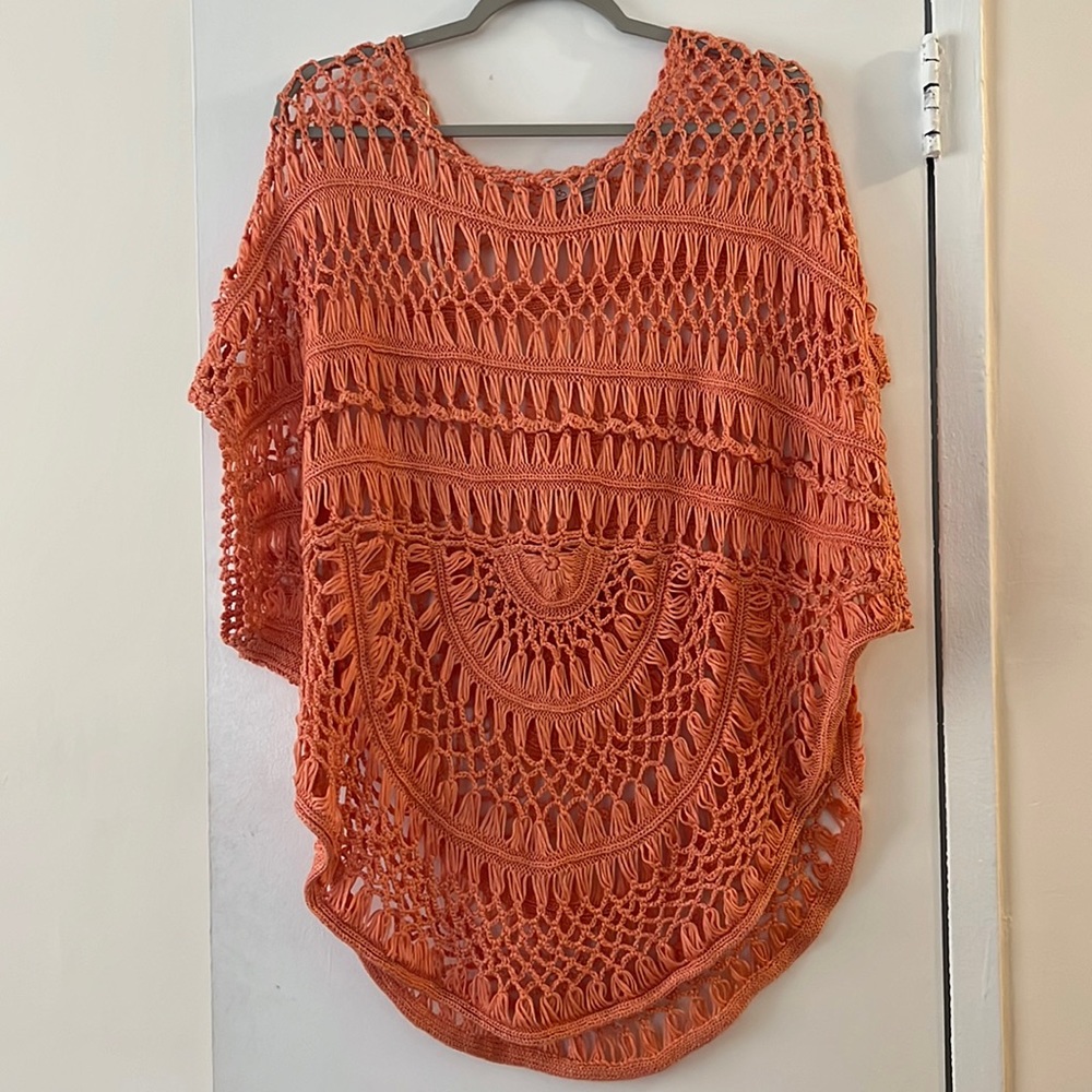 Crochet apricot cover up.
